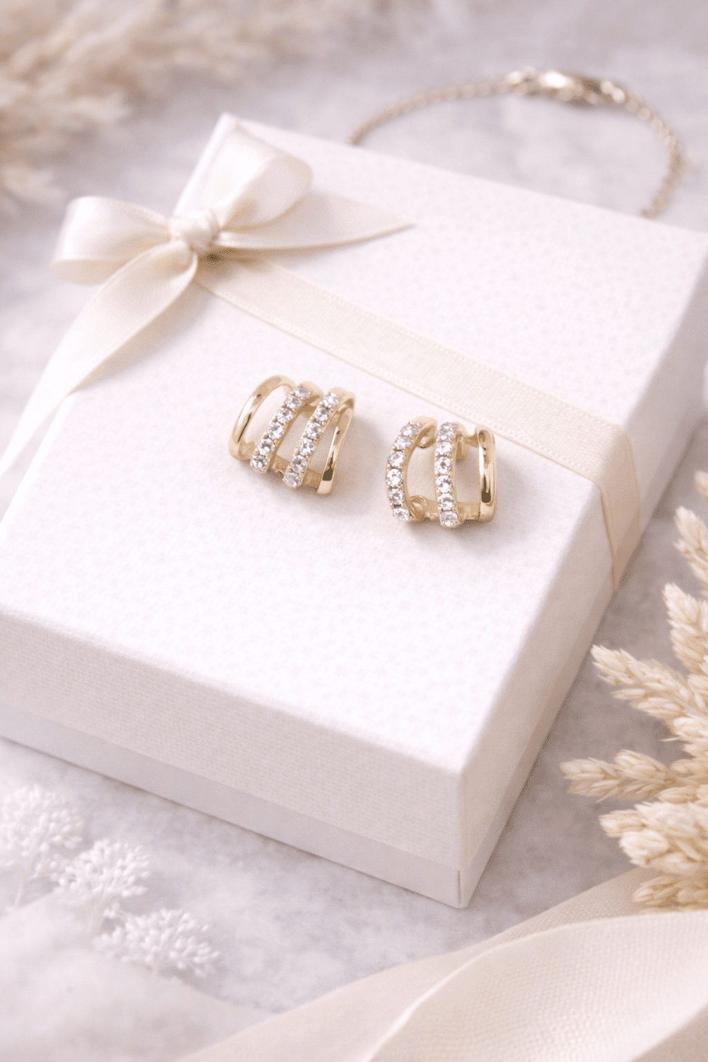 The Golden Claw: Triple-Tier Radiance Earrings