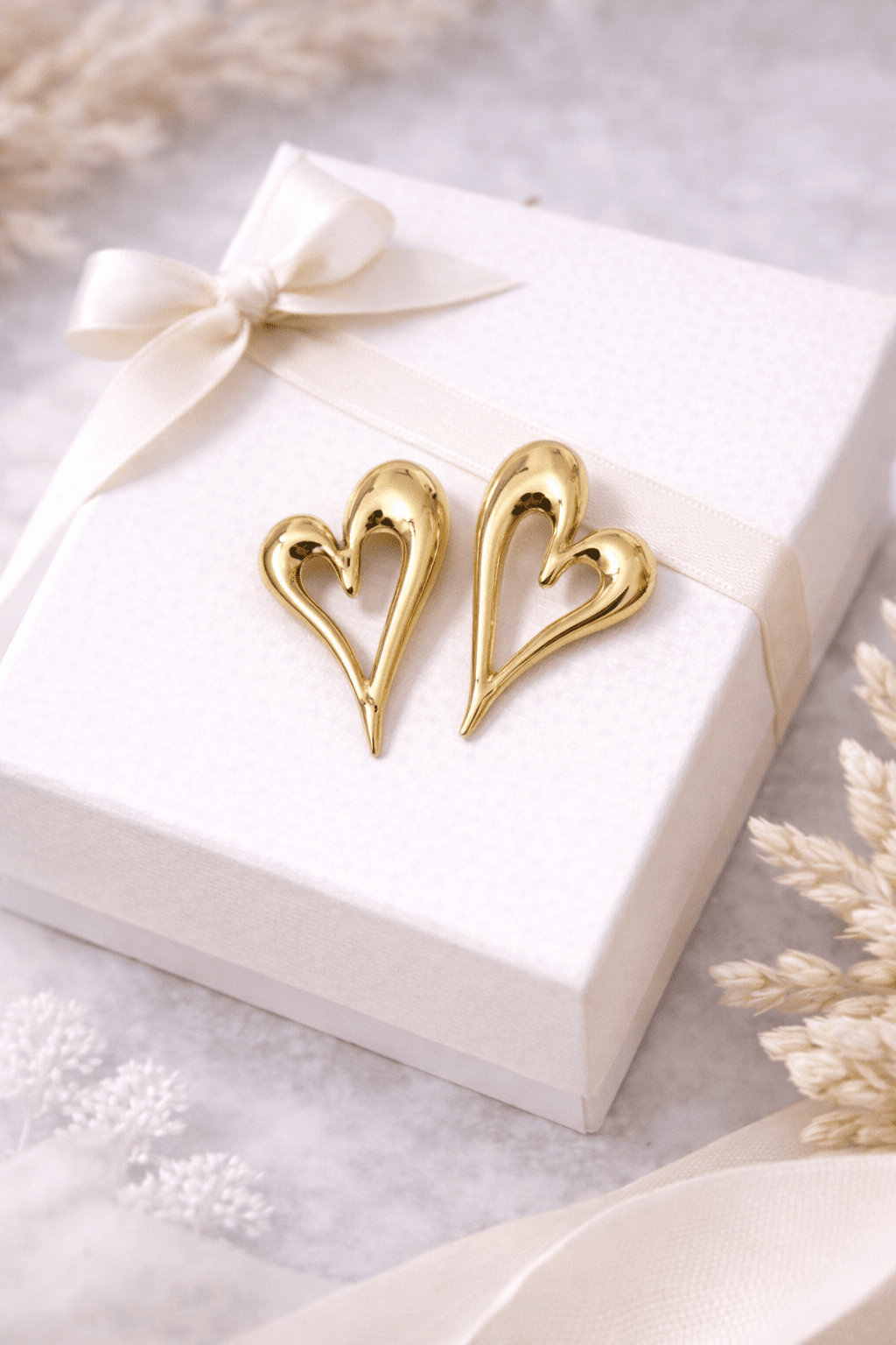Eternal Pulse: Sculpted Gold Heart Earrings